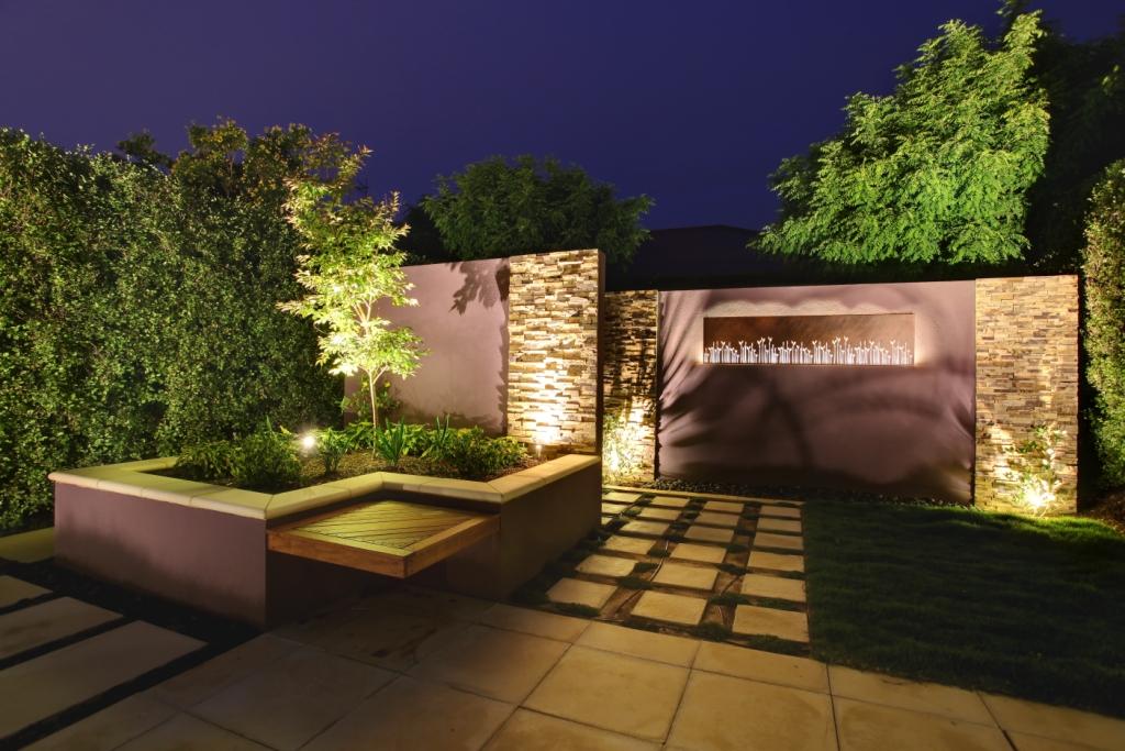 Landscaped Backyard with Hedge and Outdoor Features, Backlit Screen